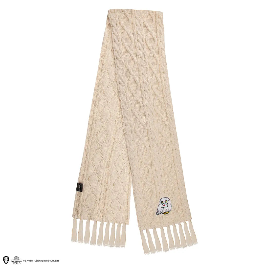 Set bonnet et écharpe Hedwige - Harry Potter, avec un design inspiré du hibou emblématique, parfait pour afficher votre passion pour la saga.