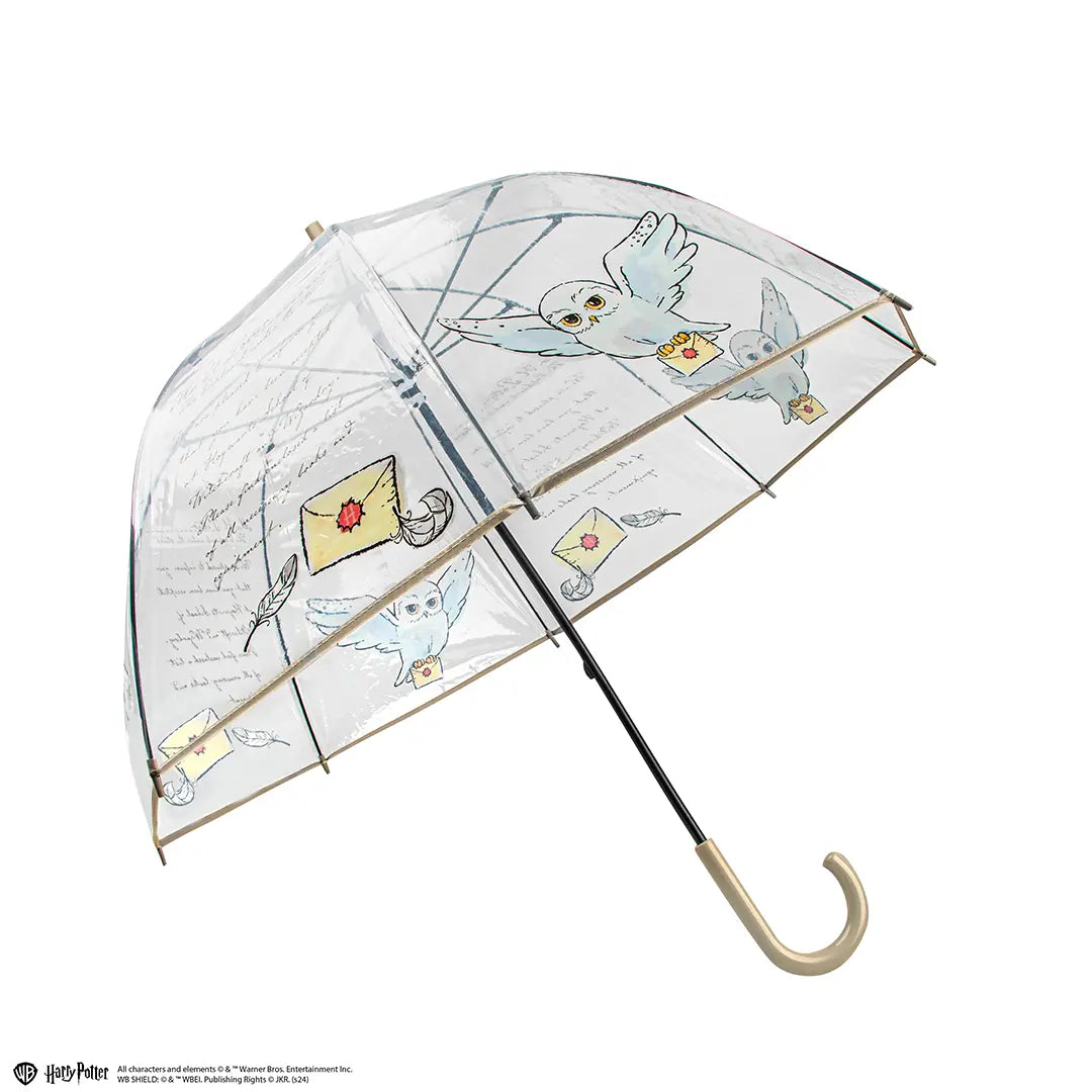 Parapluie transparent Hedwige Harry Potter sur fond élégant, capturant l'essence magique de l'univers sorcier.
