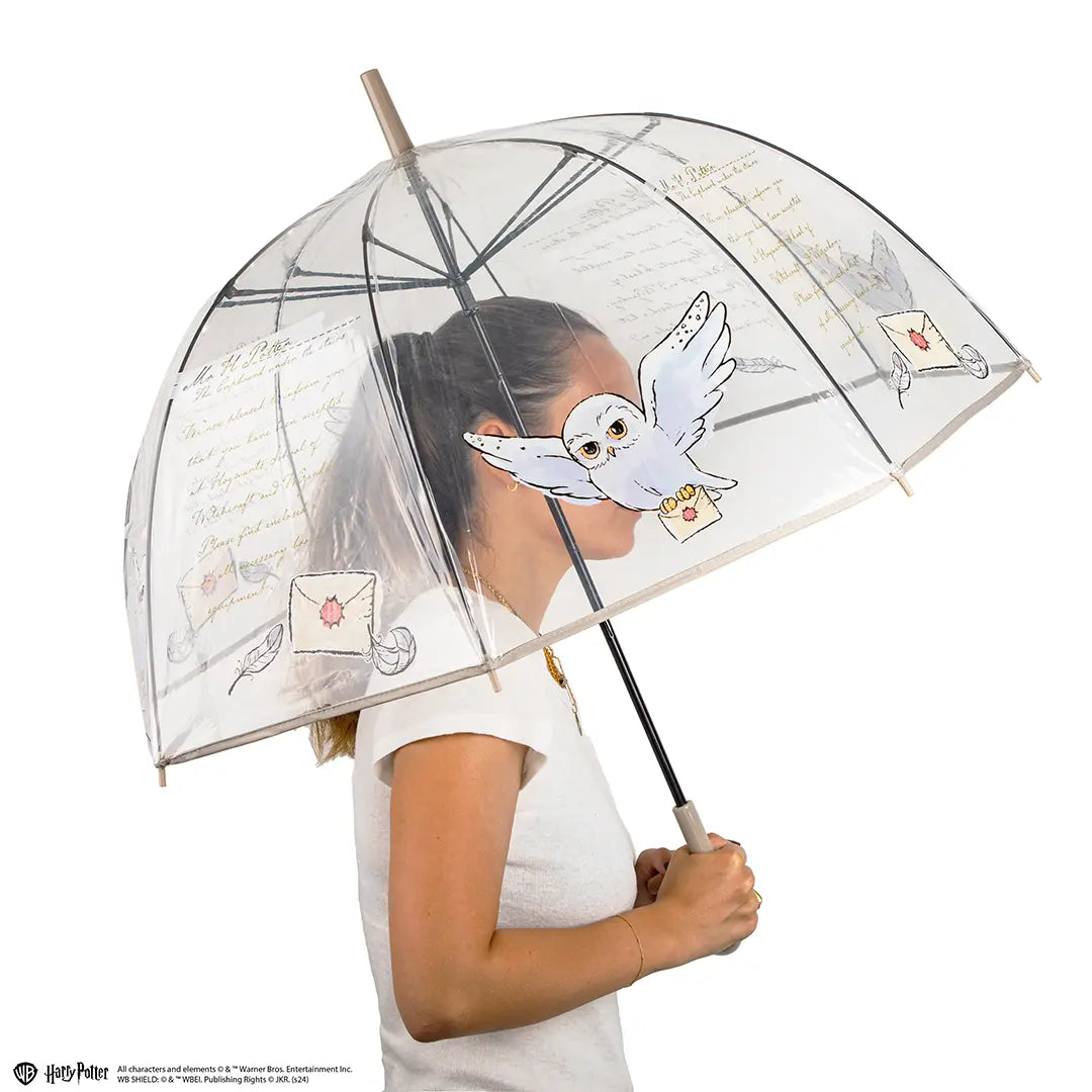 Parapluie transparent Hedwige inspiré de Harry Potter, un accessoire magique alliant élégance et protection contre la pluie, parfait pour les fans.