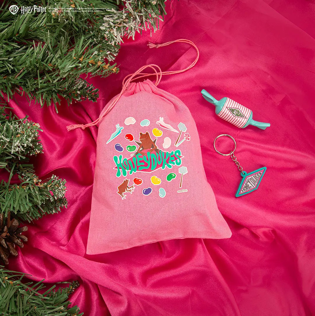 Calendrier de l’avent 2025 Honeydukes de Harry Potter par Distrineo, mettant en avant des objets magiques inspirés de la boutique de bonbons.