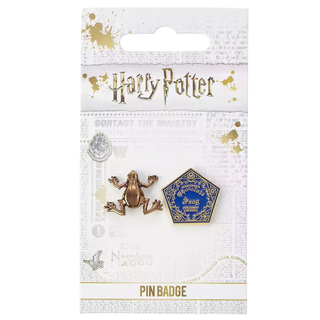 Badge Pin Chocogrenouilles - Harry Potter, un accessoire métallique élégant et captivant, parfait pour les fans de la saga magique.