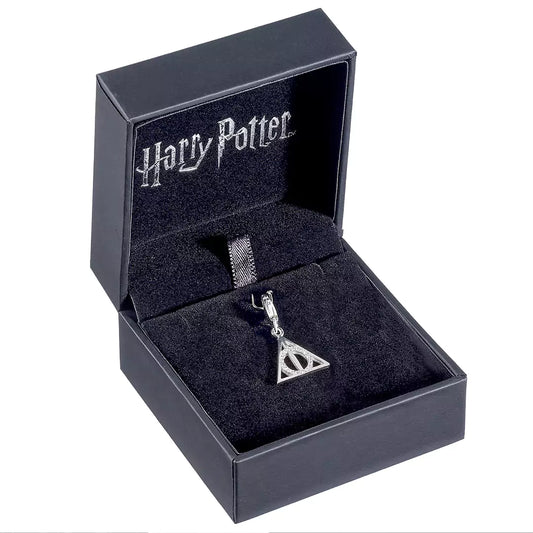 Écrin élégant du Charm à clip Reliques de la mort, parfait pour offrir un cadeau unique aux fans d'Harry Potter.