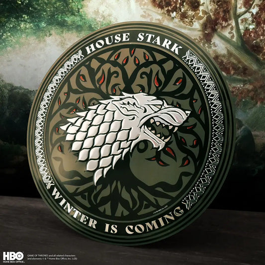 Détail de la plaque ronde en aluminium Stark - Game Of Thrones, mettant en avant la finition soignée et les dimensions de 30 cm.