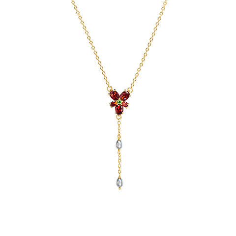 Collier Cristal Rouge d’Hermione, bijou élégant inspiré par Harry Potter, orné de cristaux brillants et plaqué or, parfait pour les passionnés de magie.