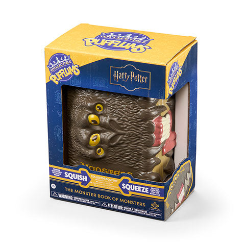 Vue du Livre des Monstres - Toyllectible Pufflums™ - Harry Potter, un objet de collection incontournable pour les fans du jeune sorcier.