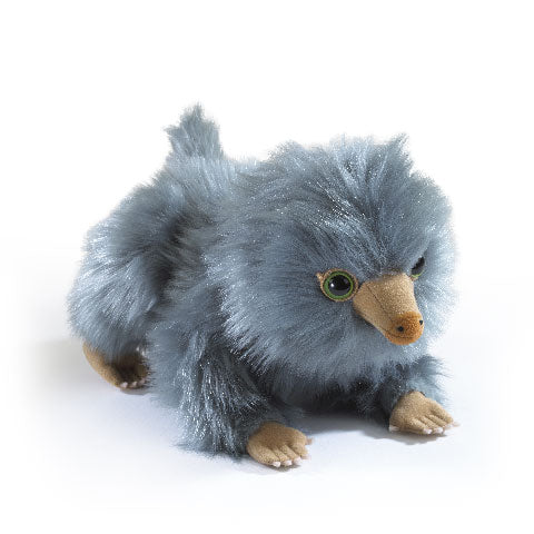 Peluche bébé Niffleur gris - Les Animaux Fantastiques, un adorable compagnon magique pour enfants, mettant en valeur son pelage doux et ses yeux pétillants.