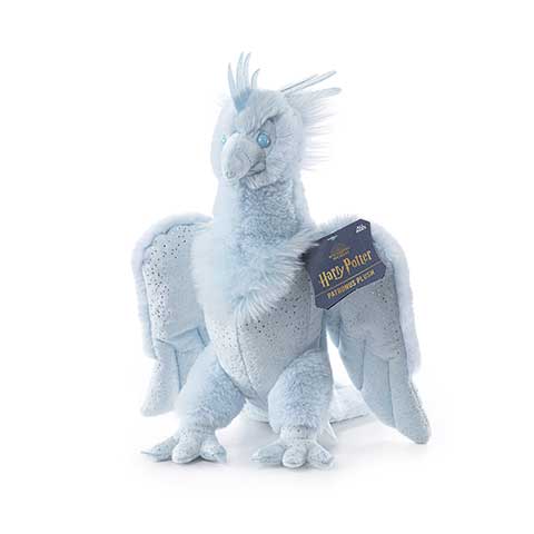 Peluche Patronus Phénix - Harry Potter posée sur un fond enchanté, symbolisant l'espoir et l'amitié, un cadeau idéal pour les amoureux de la magie.