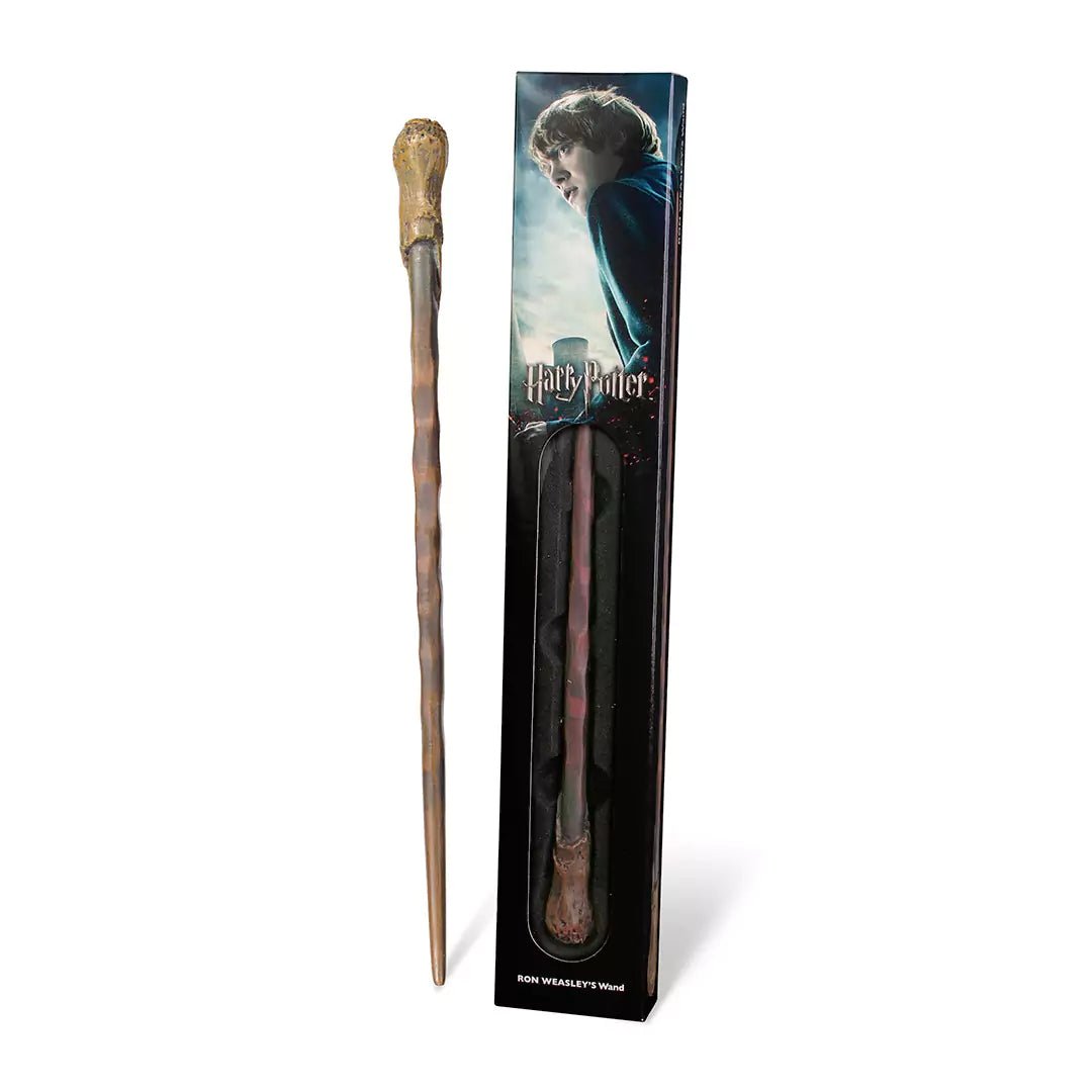 Baguette Ron Weasley de Harry Potter en résine, fabriquée par Noble Collection, présentée en blister pour les passionnés de magie et de collection.