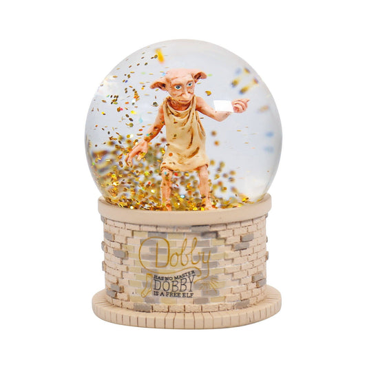 Boule à neige en boîte 65 mm - Harry Potter Dobby de Half Moon Bay, représentant le célèbre elfe Dobby au milieu de flocons scintillants, parfait pour les fans de la saga.
