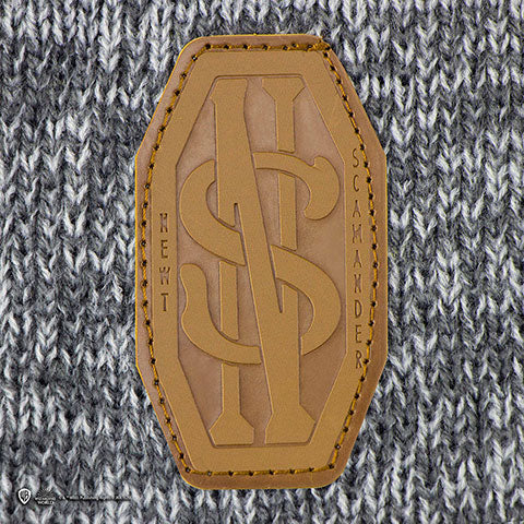 Echarpe de Norbert Dragonneau - Animaux Fantastiques, découvrez le design unique qui rend hommage à J.K. Rowling, un must-have pour tous les amateurs de créatures magiques.