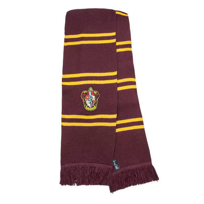 Echarpe deluxe Gryffondor pourpre et or, emblématique de Harry Potter, affichant les couleurs de la maison Gryffondor, idéale pour les fans.