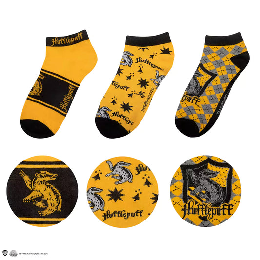 Lot de 3 paires de chaussettes courtes Poufsouffle - Harry Potter : une paire de chaussettes montrant les couleurs emblématiques de la maison Poufsouffle.