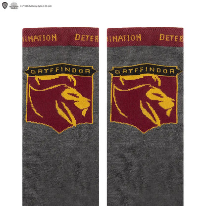 Chaussettes Gryffondor - Harry Potter, un accessoire magique affichant fièrement les couleurs emblématiques de la maison Gryffondor, parfaites pour les fans.