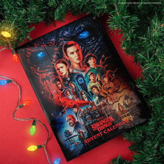 Calendrier de l’avent 2023 - Stranger Things avec des illustrations mystérieuses de l’Upside Down révélant des surprises quotidiennes.