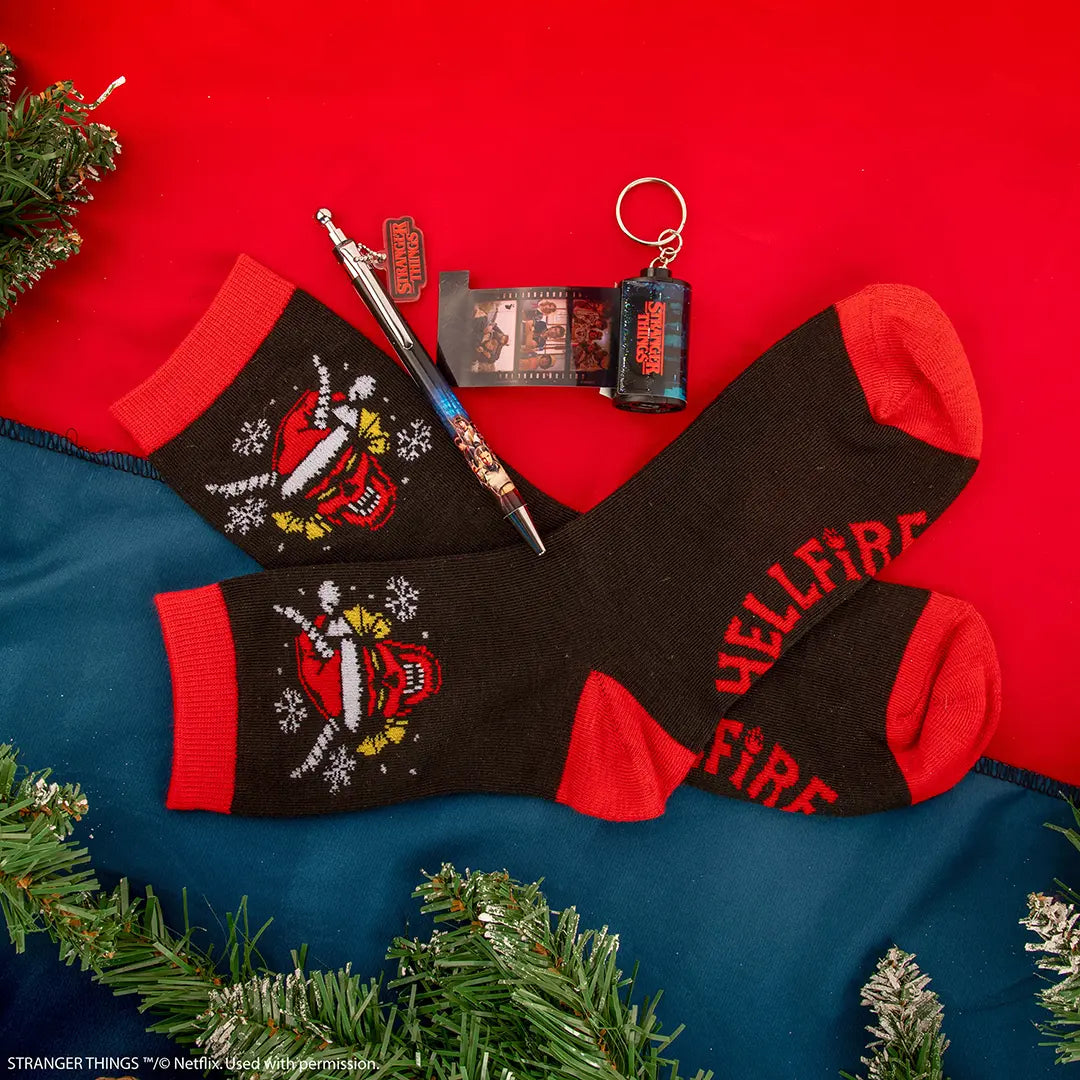 Calendrier de l’avent Deluxe 2025 - Stranger Things : La boîte magnétique en forme de téléviseur rétro, un élément de collection incontournable.