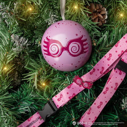 Pins emblématiques de Luna Lovegood de la capsule de vacances Harry Potter, ajoutant une touche de fantaisie à vos tenues.