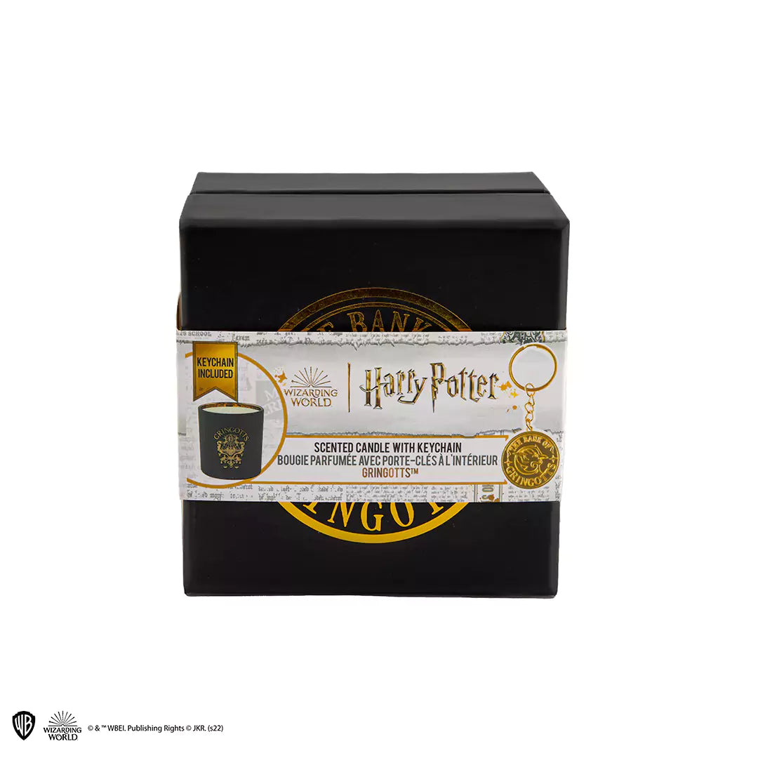 Bougie Gringotts et porte-clés - Harry Potter, montrant le design raffiné de la bougie dans un élégant pot en verre, idéale pour un cadeau unique aux fans de la saga.