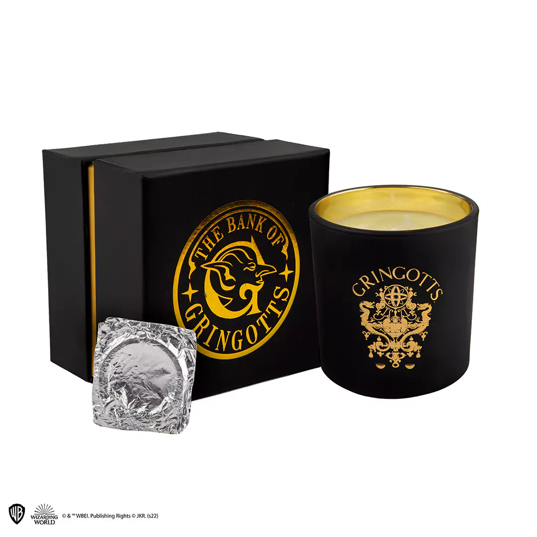 Bougie Gringotts et porte-clés - Harry Potter, une bougie en cire naturelle avec parfum fleur d'oranger, contenue dans un élégant pot en verre de 190ml, idéale pour les fans de la saga.