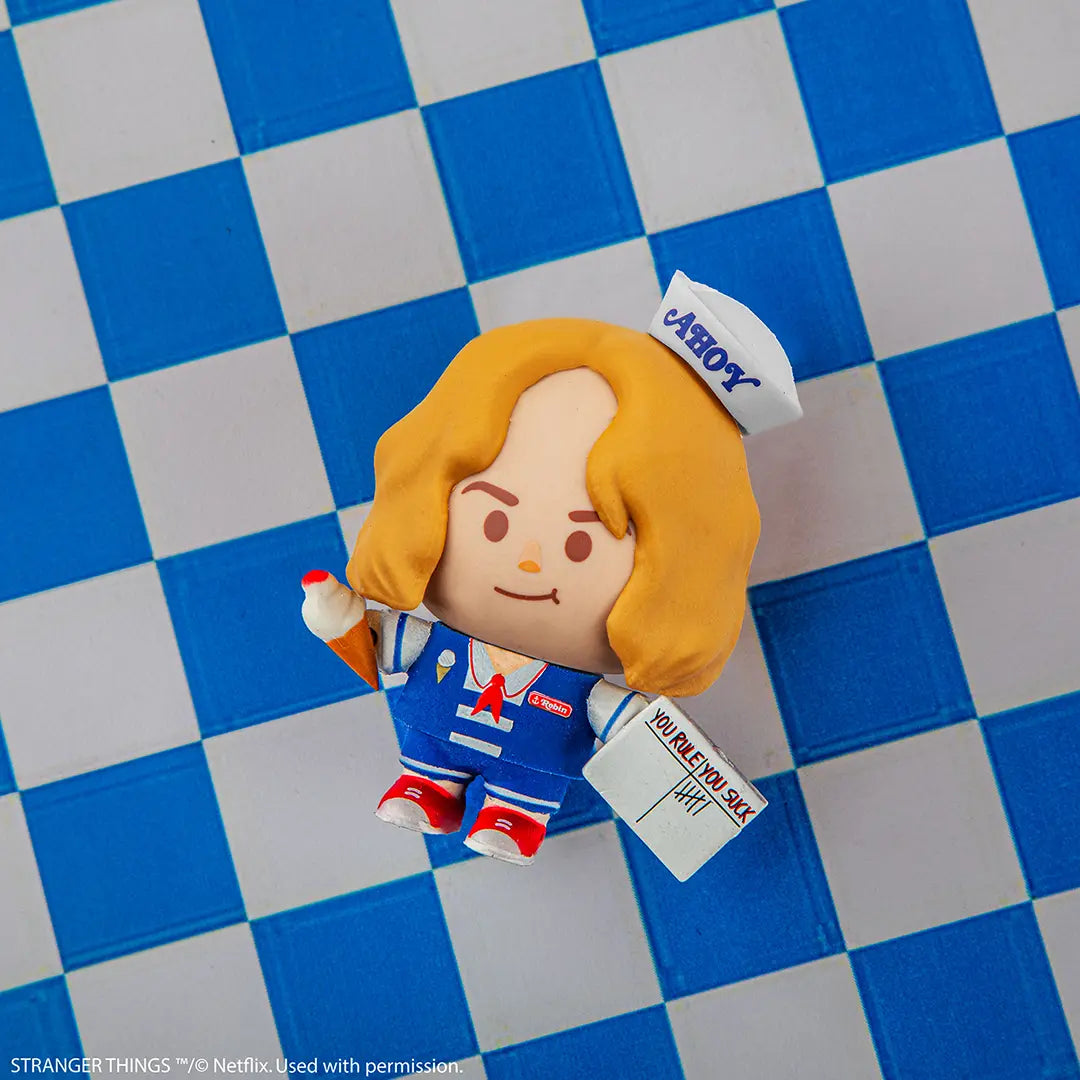 Détails des accessoires de la figurine Gomee - Stranger Things, montrant les éléments interchangeables pour une personnalisation amusante.