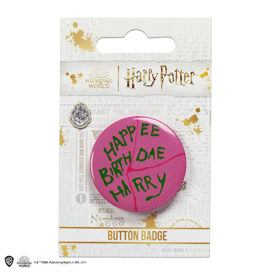 Badge Gâteau Happee Birthday - Harry Potter, un accessoire magique pour rendre votre anniversaire inoubliable, parfait pour les fans de la célèbre saga.