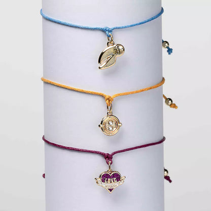 Bracelet d’amitié rose doré Harry Potter avec charme Love Potion, symbole d'amour et d'amitié.