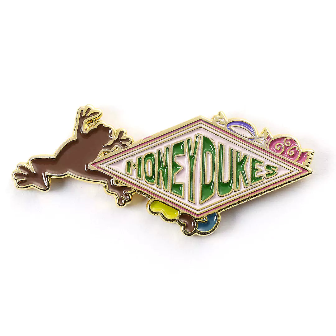 Pin's logo Honeydukes de Harry Potter, un accessoire magique en plaqué or, parfait pour les fans de l'univers de Poudlard.