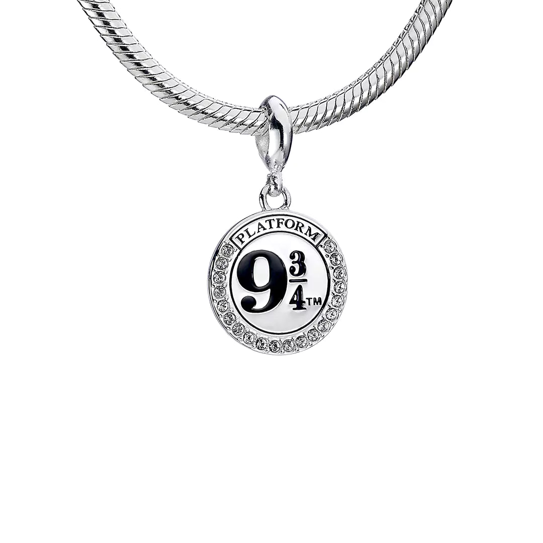 Charm à clip Plateforme 9 3/4 en argent 925ème orné de cristaux étincelants - Un bijou emblématique de l'univers Harry Potter.