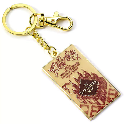 Porte-clés Carte du Maraudeur - Harry Potter, un accessoire en métal doré illustrant la carte magique de Poudlard, symbole d'amitié et d'aventure.