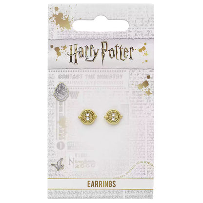 Boucles d’oreilles Retourneur de temps immobile - Harry Potter, présentées dans un écrin officiel au logo Warner Bros, idéales pour les fans et collectionneurs.