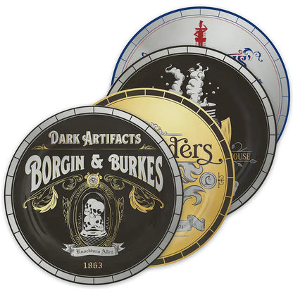 Assiette Chemin de Traverse Harry Potter - Lot de 4 assiettes illustrant des enseignes emblématiques de l'univers magique.