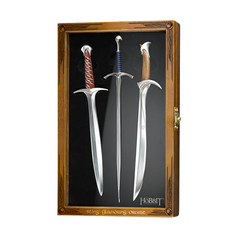 Set 3 ouvre-lettres - Un élégant ensemble d'ouvre-lettres inspiré des célèbres épées de la Terre du Milieu, incluant Dard, Glamdring et Orcrist, présenté dans un coffret en bois vitré.