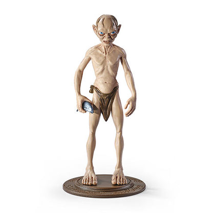 Figurine Gollum Toyllectible Bendyfigs - Le seigneur des anneaux, représentant le célèbre personnage dans son design détaillé avec un accessoire de poisson.