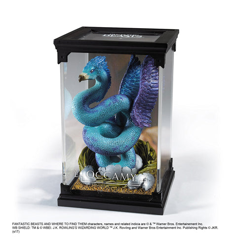 Figurine Occamy de la collection Créatures magiques - Animaux Fantastiques, ornée de détails exquis et de plumes scintillantes, idéale pour les fans de Harry Potter.