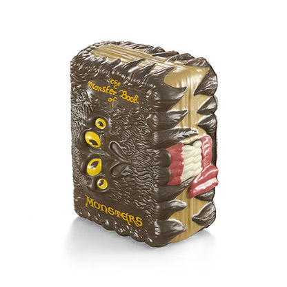 Livre des Monstres - Toyllectible Pufflums™ - Harry Potter, illustrant un Pufflum adorable, inspiré de l'univers magique de Harry Potter.
