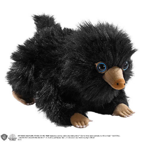 Peluche bébé Niffleur noir - Les Animaux Fantastiques, compagnon doux et câlin, parfait pour les fans d'Harry Potter, avec un design réaliste et des grandes oreilles fascinantes.