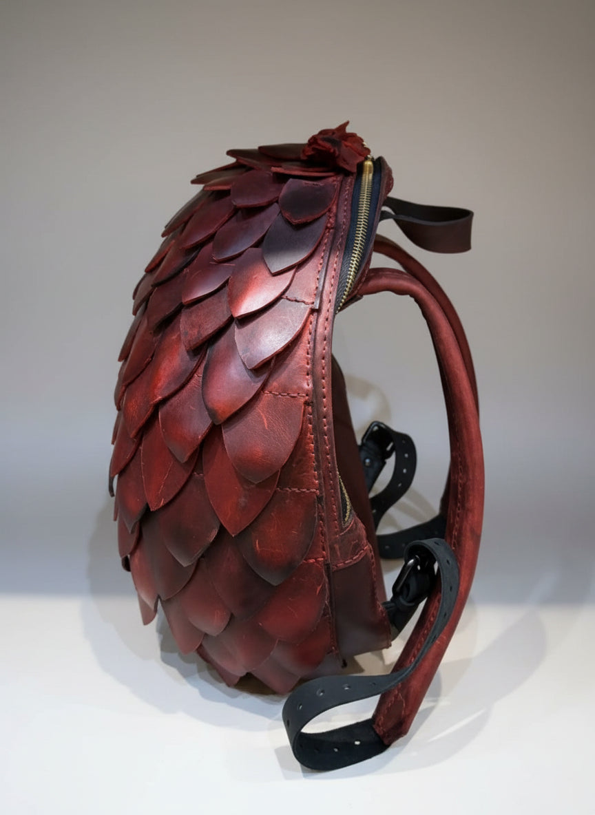 Sac à dos œuf de Dragon en cuir véritable, élégant et artisanal, inspiré des mondes fantastiques, design unique et captivant.