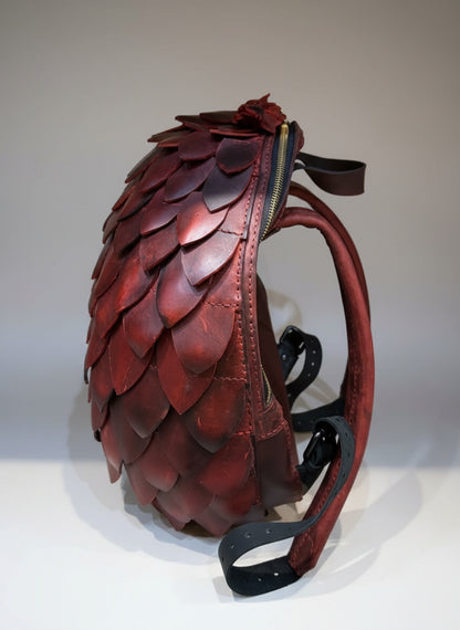 Sac à dos œuf de Dragon en cuir véritable, élégant et artisanal, inspiré des mondes fantastiques, design unique et captivant.