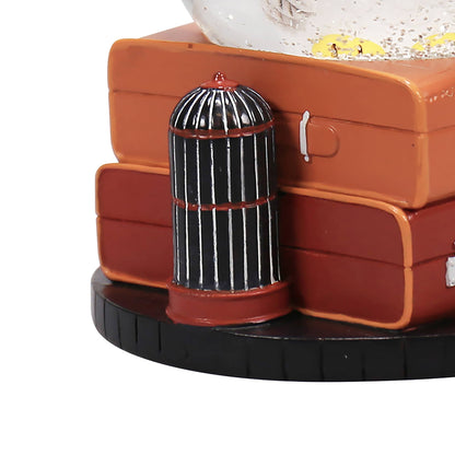 Emballage élégant de la boule à neige Hedwige Harry Potter, une création de Half Moon Bay, au design captivant pour les férus de magie.