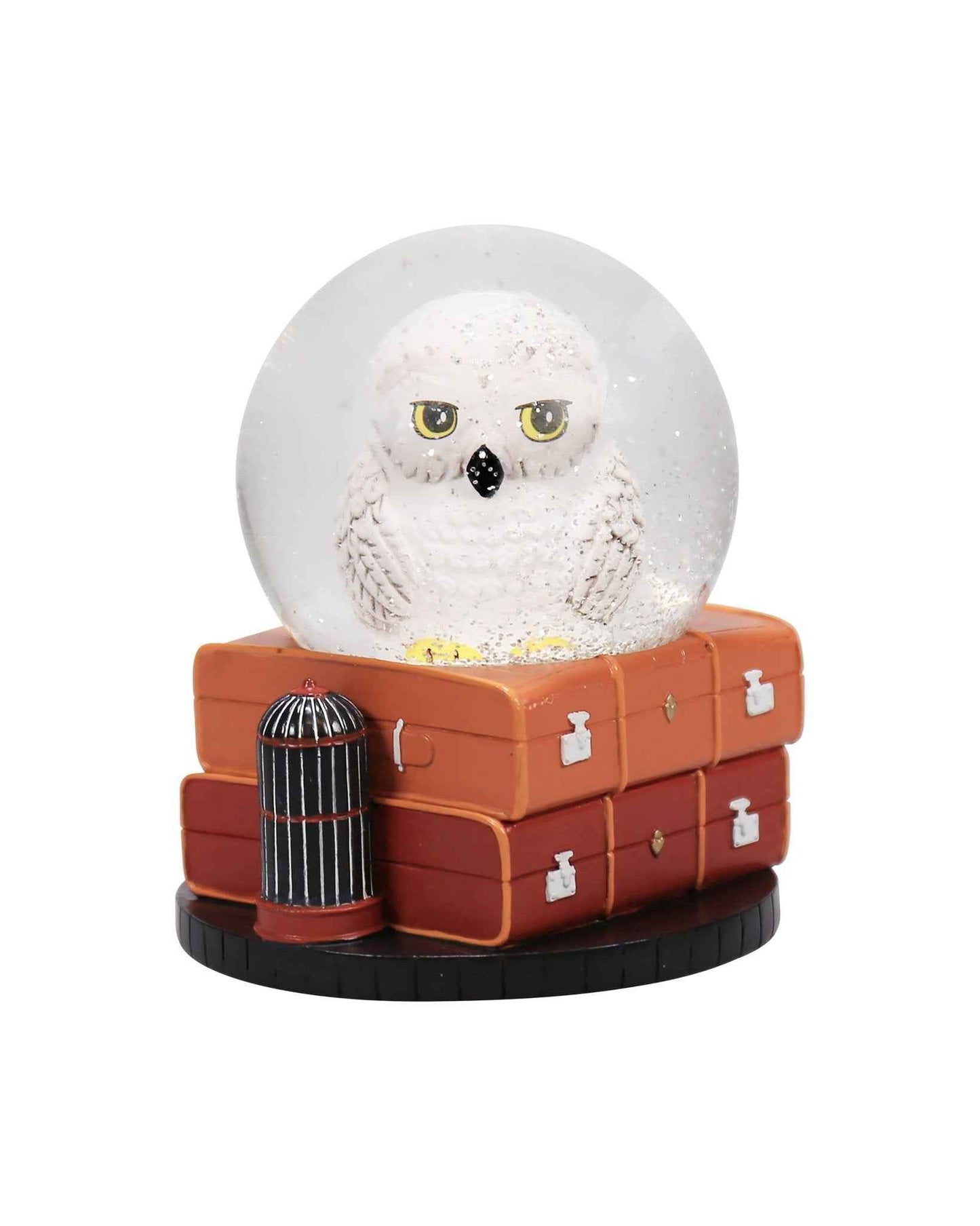 Boule à neige Harry Potter Hedwige en polyrésine, pièce de collection présentée par Half Moon Bay, idéale pour les fans magiques.