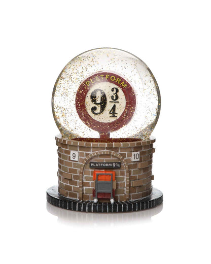 Boule à neige en boîte de 65 mm représentant la plateforme 9 3/4 de Harry Potter, fabriquée par Half Moon Bay, parfaite pour ajouter une touche de magie à votre décoration.