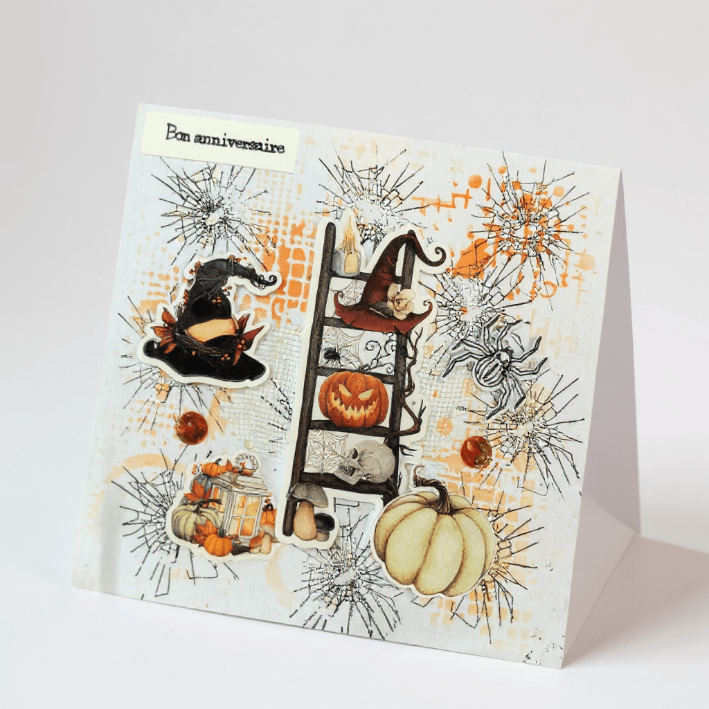 Carte pop-up « Halloween Anniversaire » de La Carterie de Fanny, présentant des citrouilles souriantes et des guirlandes chatoyantes, parfaite pour célébrer les anniversaires d'octobre.