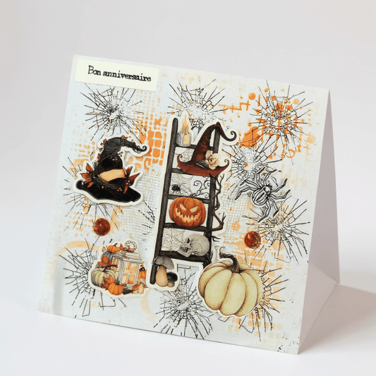Carte pop-up « Halloween Anniversaire » de La Carterie de Fanny, présentant des citrouilles souriantes et des guirlandes chatoyantes, parfaite pour célébrer les anniversaires d'octobre.