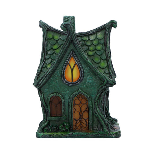 Chalet Evergreen 17cm de Nemesis Now, un cottage féérique gothique avec un toit pointu et fenêtres illuminées, évoquant une forêt enchantée.