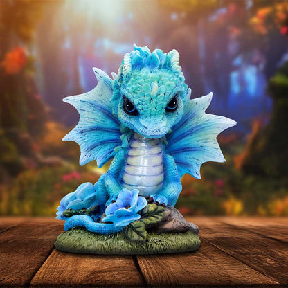 Figurine de Dragon fleur de pavot bleue 11 cm, représentant un dragon captivant aux teintes éclatantes et aux détails sculptés, idéal pour enrichir votre collection fantastique.